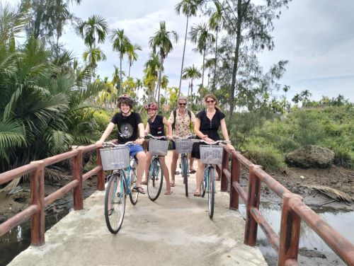 Young group of western People cycling in Cam Thanh